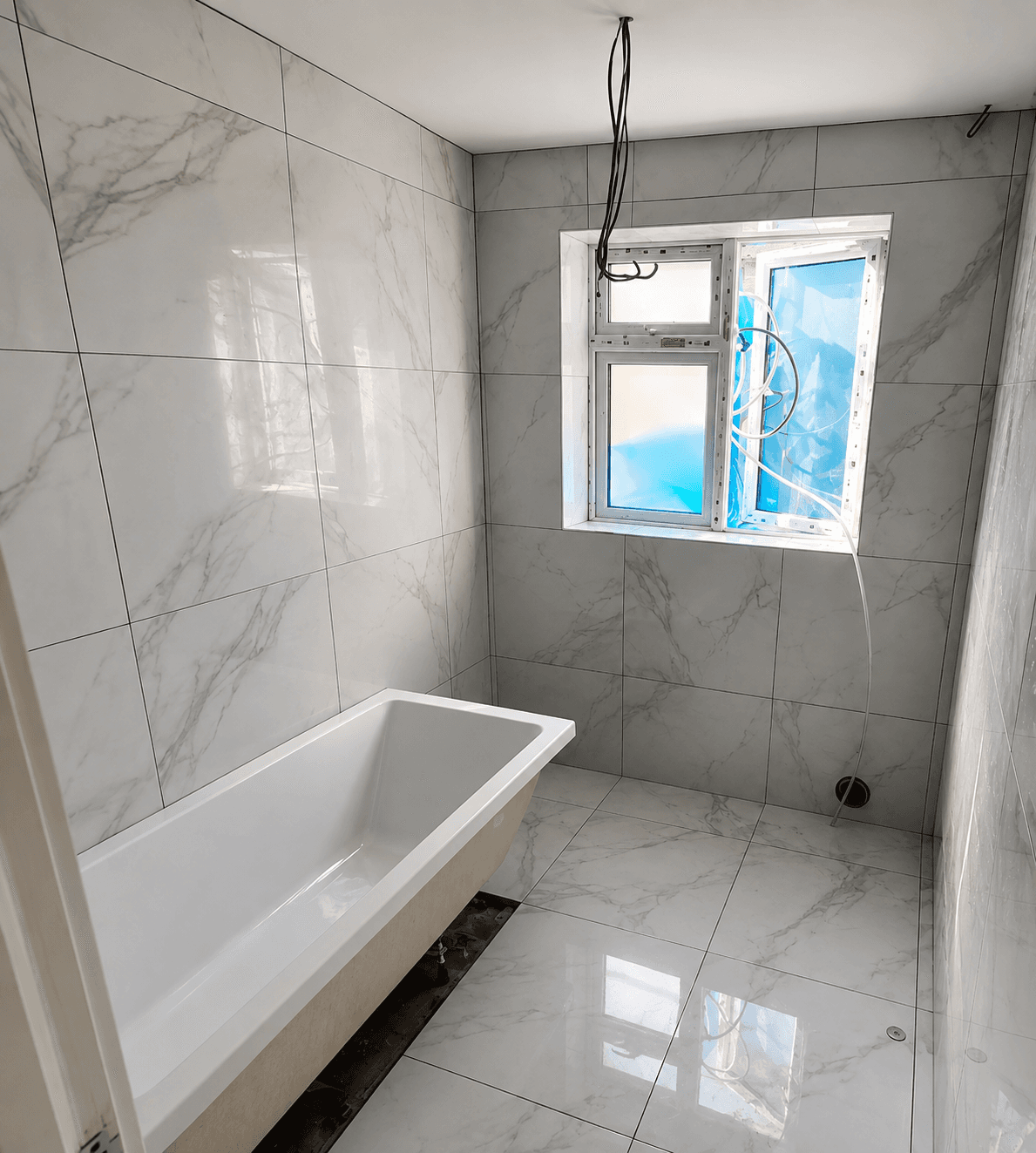 Marble Effect Bathroom by KB Tiling Essex